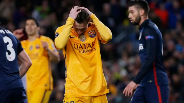 Lionel Messi looks dejected