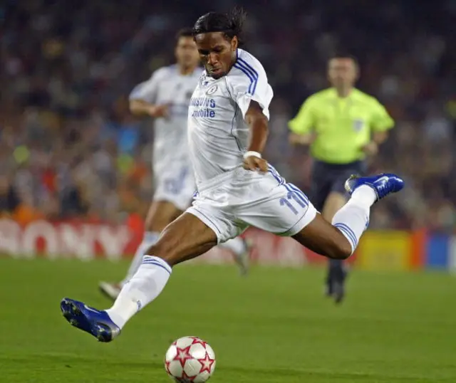 Chelsea footballer Didier Drogba has a shot on goal against Barcelona during a Champions League Group A football match