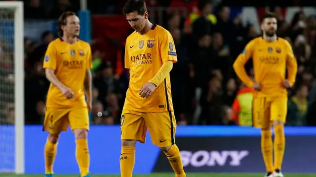 Lionel Messi looks dejected