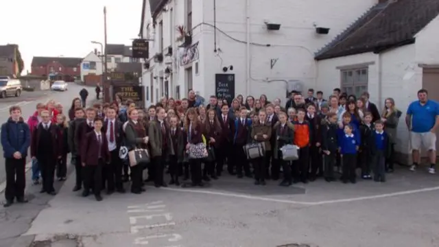 Children and parents in Warton