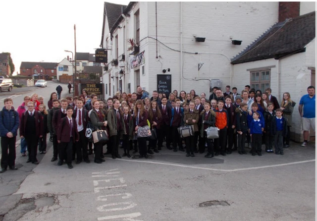 School children and protesting parents