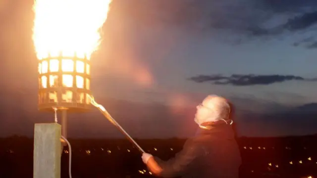 Rev Ian Cardinal lights Stone’s beacon for the Queen’s Diamond Jubilee in 2012