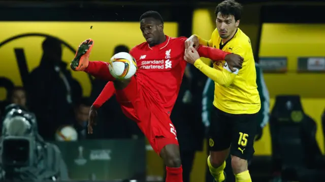 Divock Origi controls the ball