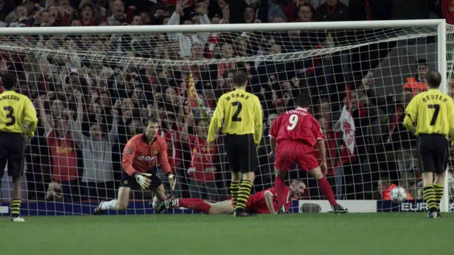 Stephen Wright (on the floor) scores against Dortmund in 2001