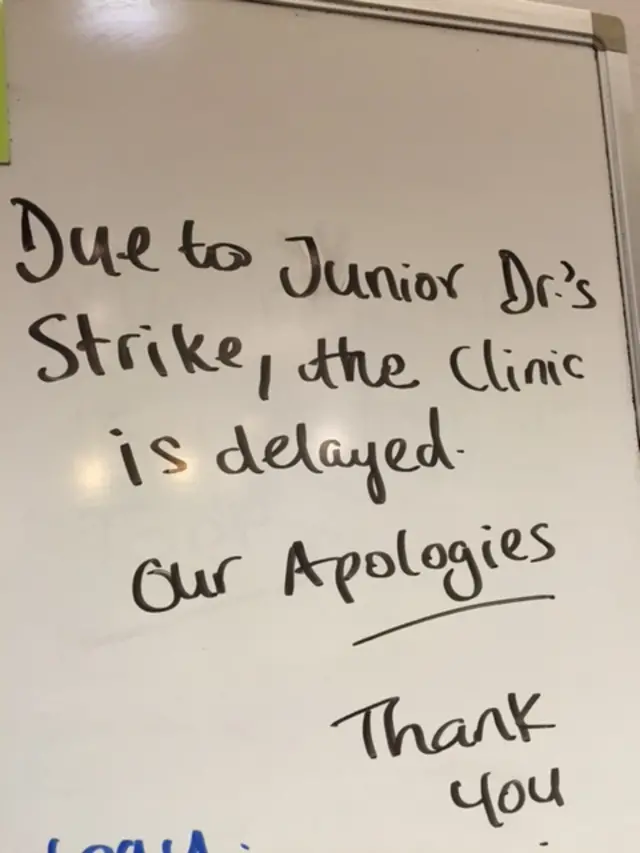 A sign reading: "Due to Junior Dr's strike, the clinic is delayed, Our apologies, thank you'