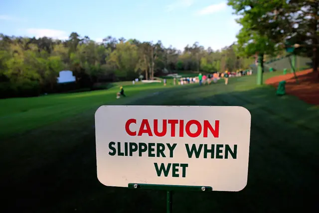 A caution sign at the 11th hole at Augusta