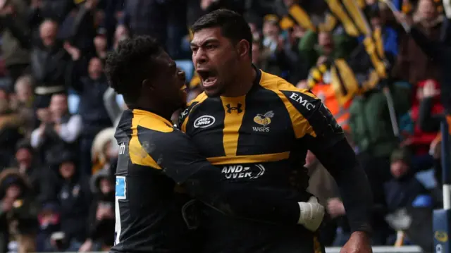 Charles Piutau celebrates scoring a try for Wasps