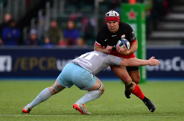 Saracens' Schalk Brits is tackled