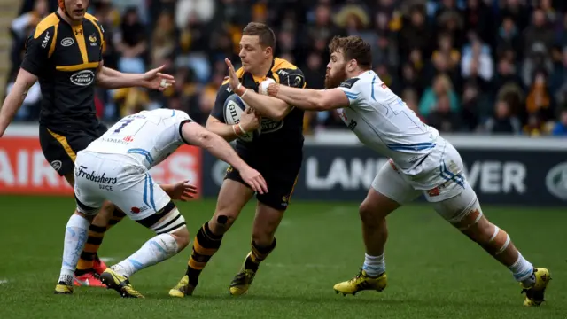 Wasps' Jimmy Gopperth is tackled