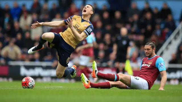 Andy Carroll commits a foul