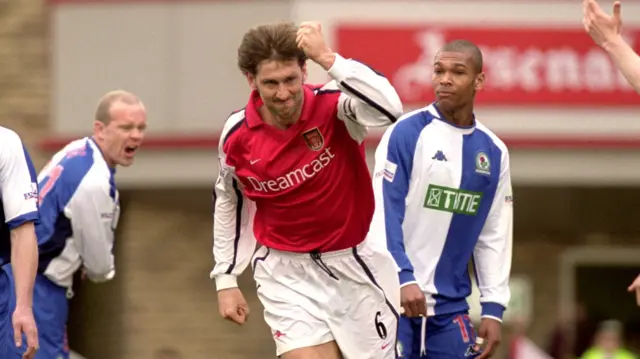 Tony Adams celebrates