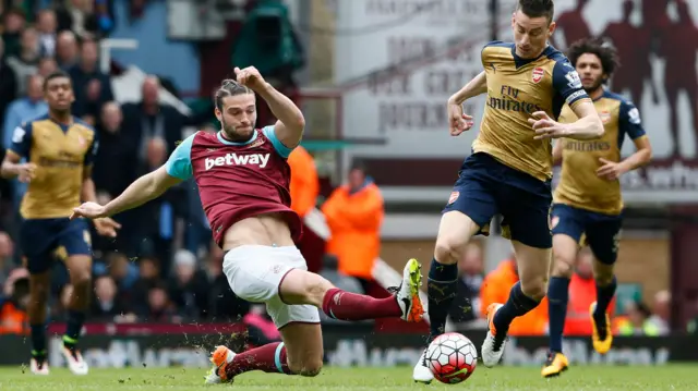 Laurent Koscielny and Andy Carroll