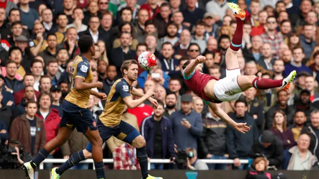 Andy Carroll attempts an overhead kick