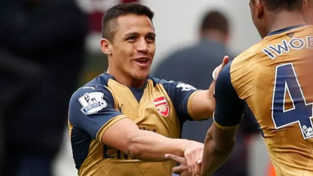 Alexis Sanchez celebrates