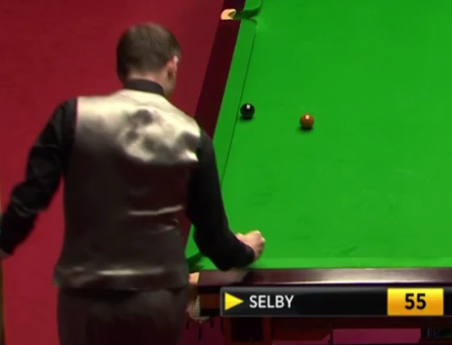 Mark Selby punches the table