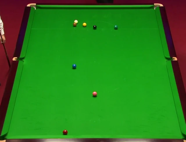 Mark Selby plays a snooker