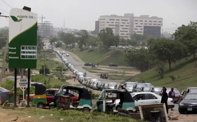 Cars queuing for fuel