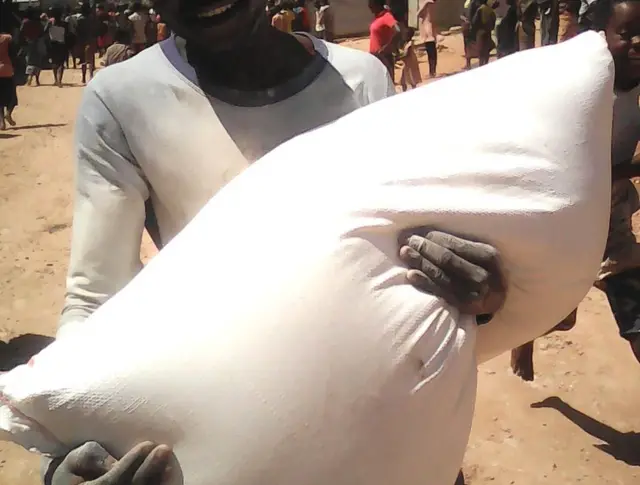 Man looting a shop