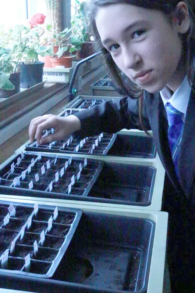 Student with seeds