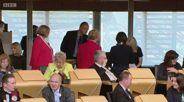 Scrutineers and MSPs observe the vote count