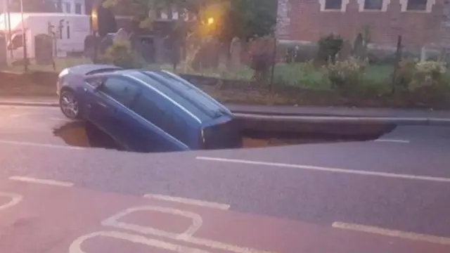 Car in hole