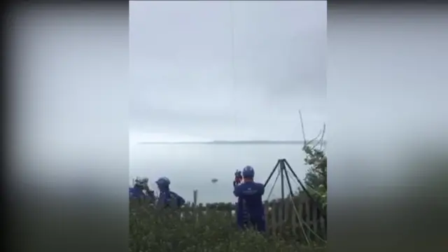 Man being rescued