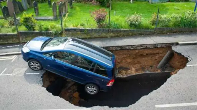 Car in the sinkhole