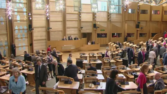 MSPs go to the back of the chamber to vote