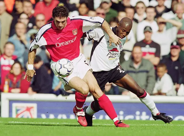 Martin Keown of Arsenal denies Luis Boa Morte of Fulham during the FA Barclaycard Premiership match between Arsenal and Fulham at Craven Cottage in London. Arsenal won 3-1 )2001)