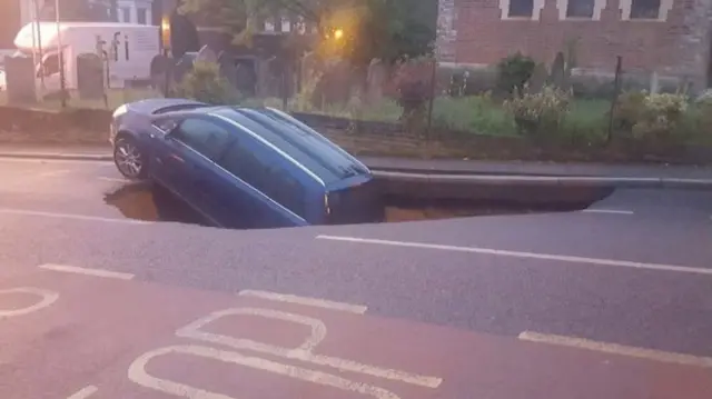 Car in sinkhole