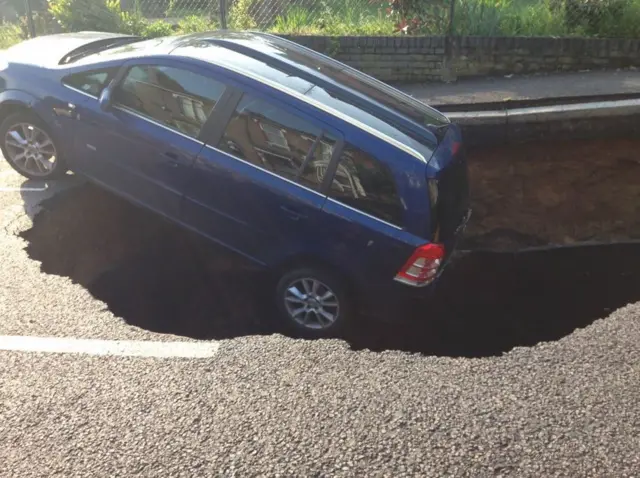 Car in hole