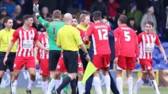 Accrington players appealed with Trevor Kettle after Billy Kee's goal was ruled out