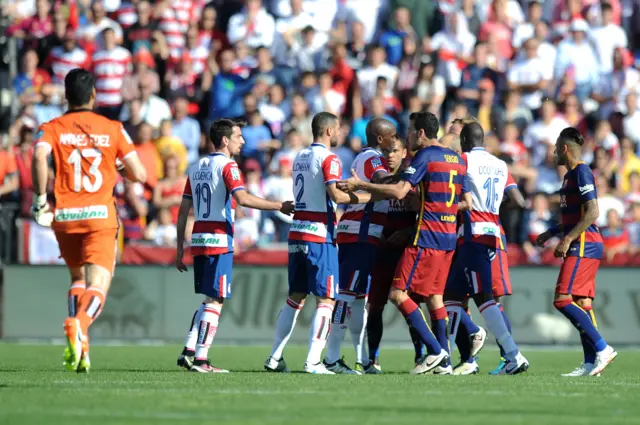 Granada players are booked