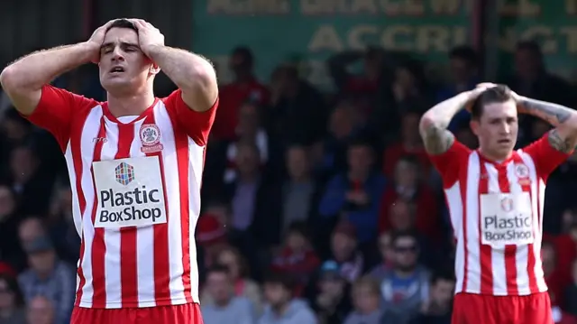 Terry Gornell and Josh Windass of Accrington Stanley looks on dejected after missing the chance at automatic promotion