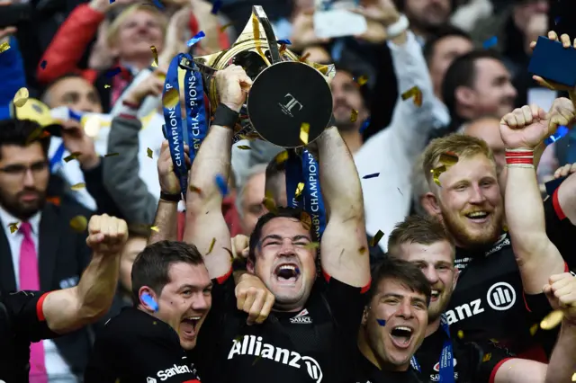 Brad Barritt of Saracens lifts the trophy