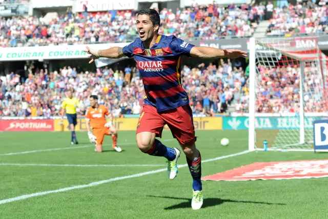 Luis Suarez celebrates his second goal