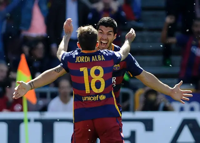 Kuis Suarez celebrates with Jordi Alba