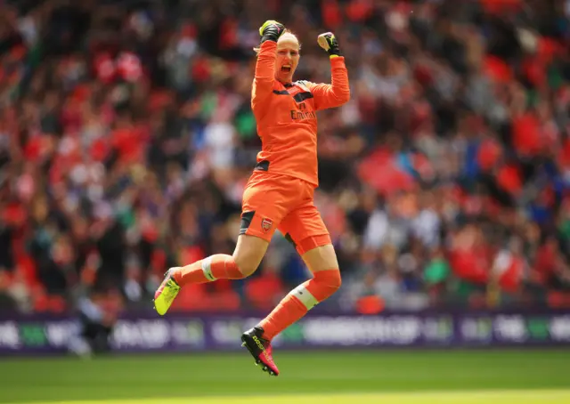 Goalkeeper Sari van Veenendaal of Arsenal celebrates as Danielle Carter of Arsenal