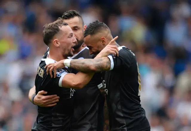 Danny Drinkwater celebrates with his teammates