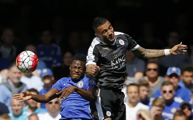 Baba Rahman and Danny Simpson try to win the header