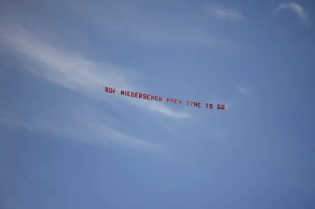 Sunderland fans fly a banner over the stadium