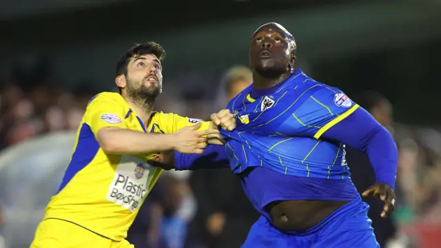 Adebayo Akinfenwa (right)