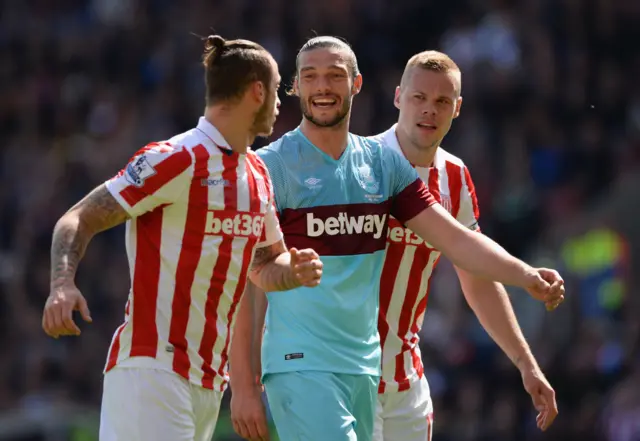 Andy Carroll is in the thick of the action