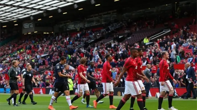 Players walk off pitch