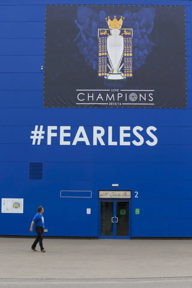 Man outside stadium