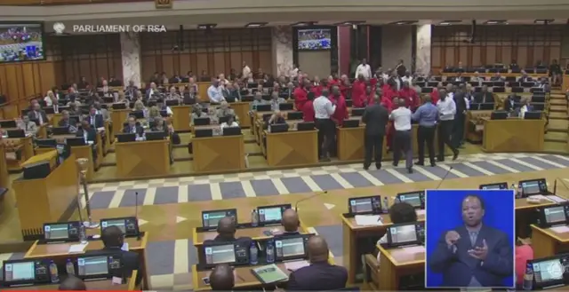 Security guards gathering around EFF