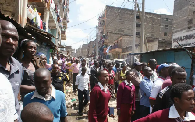 Onlookers to the demolition