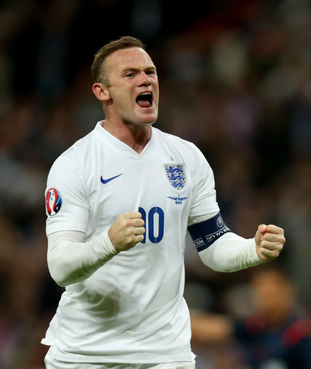 Wayne Rooney celebrates scoring for England