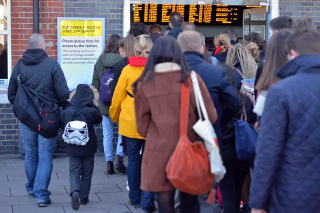 Queue at Clapham Junction railway station in London