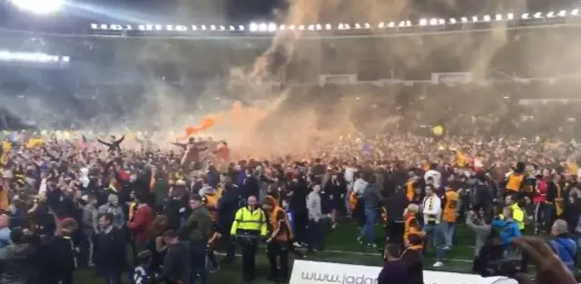 Pitch invasion following Hull City's win at Wembley